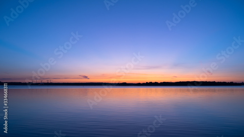 Sky at dawn and peaceful lake  beautiful view of sunrise © Wheat field