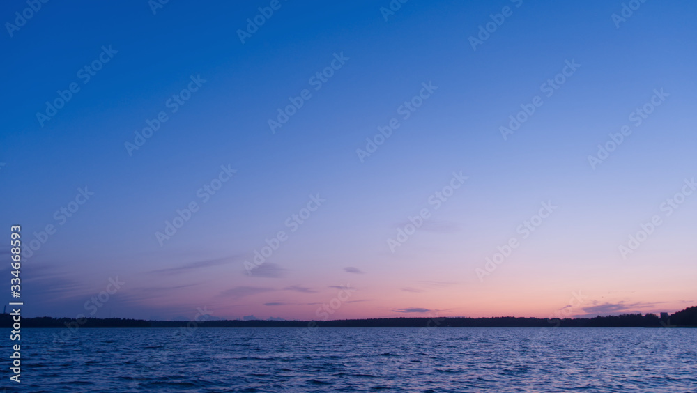 Lake at sunset; beautiful blue sky Lake at sunset; beautiful blue sky