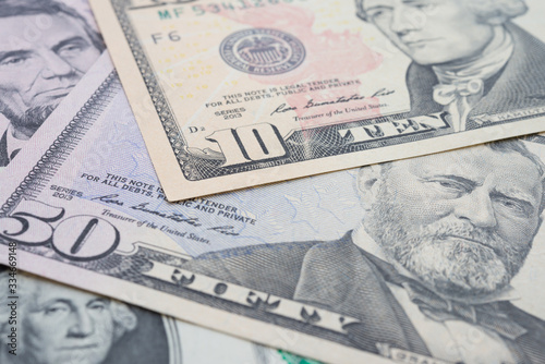 Wallpaper Mural Close up portrait of president and American states man on US dollar banknotes bill background. US or world global economy financial, business, commerce concept Torontodigital.ca