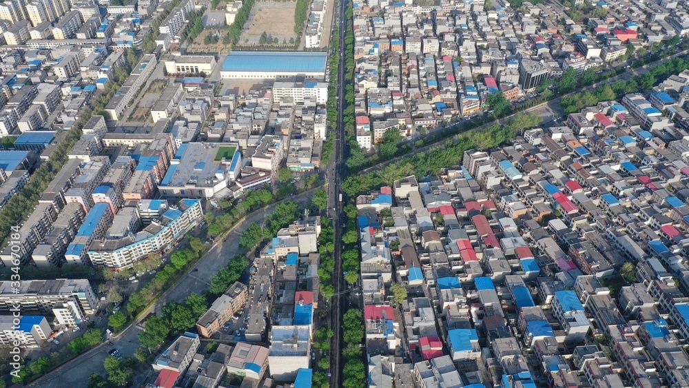 Aerial view of city buildings and roads in early morning sunlight, China Aerial view of city buildings and roads in early morning sunlight, China