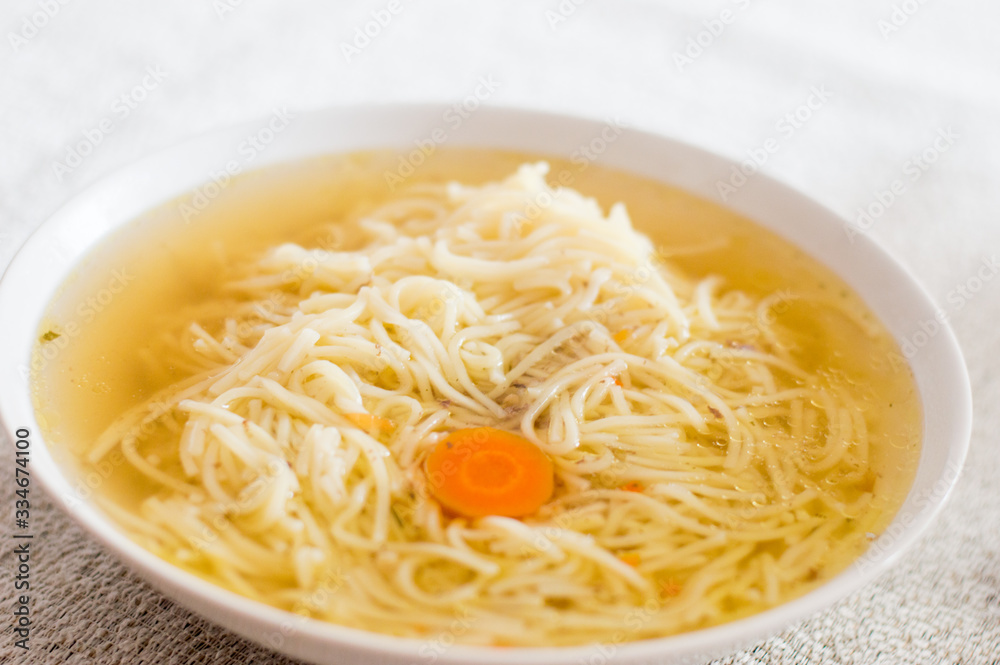 Bowl of broth noodle soup.. Bowl of broth noodle soup..