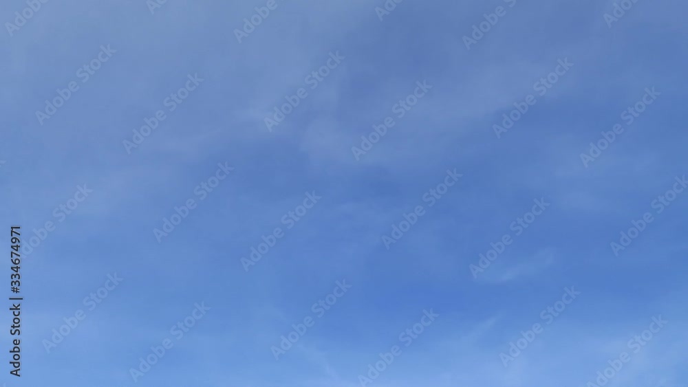 Loop features TimeLapse motion of White clouds formation as smoke & fog moving on dramatic moody wispy & cloudy sky background in morning sunlight, overcast concept, transitional & meditative vdo 