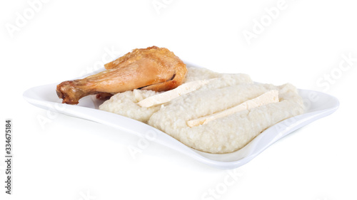 Mengrelian corn mamalica, ghomi with cheese and chicken on white background photo