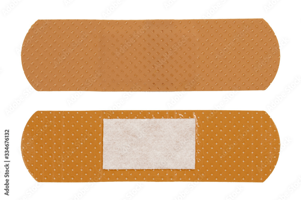 Adhesive bandage plasters isolated on white background. Medical plasters with two sides. Adhesive bandage plasters isolated on white background. Medical plasters with two sides.