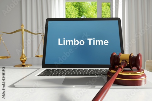 Limbo Time – Law, Judgment, Web. Laptop in the office with term on the screen. Hammer, Libra, Lawyer.