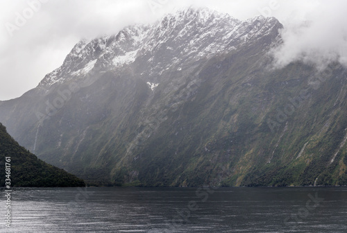 steep rocky slopes at fjord shores, Milford Sound, New Zealand