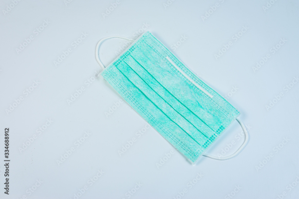 face mask to protect against corona virus on a white background face mask to protect against corona virus on a white background