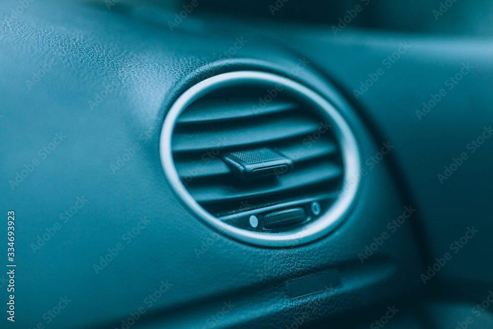 Car interior. Car air conditioning, air supply close-up.