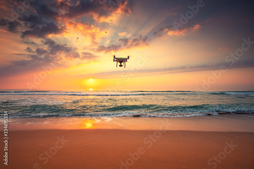 Beautiful morning over the sea and flying drone © ValentinValkov