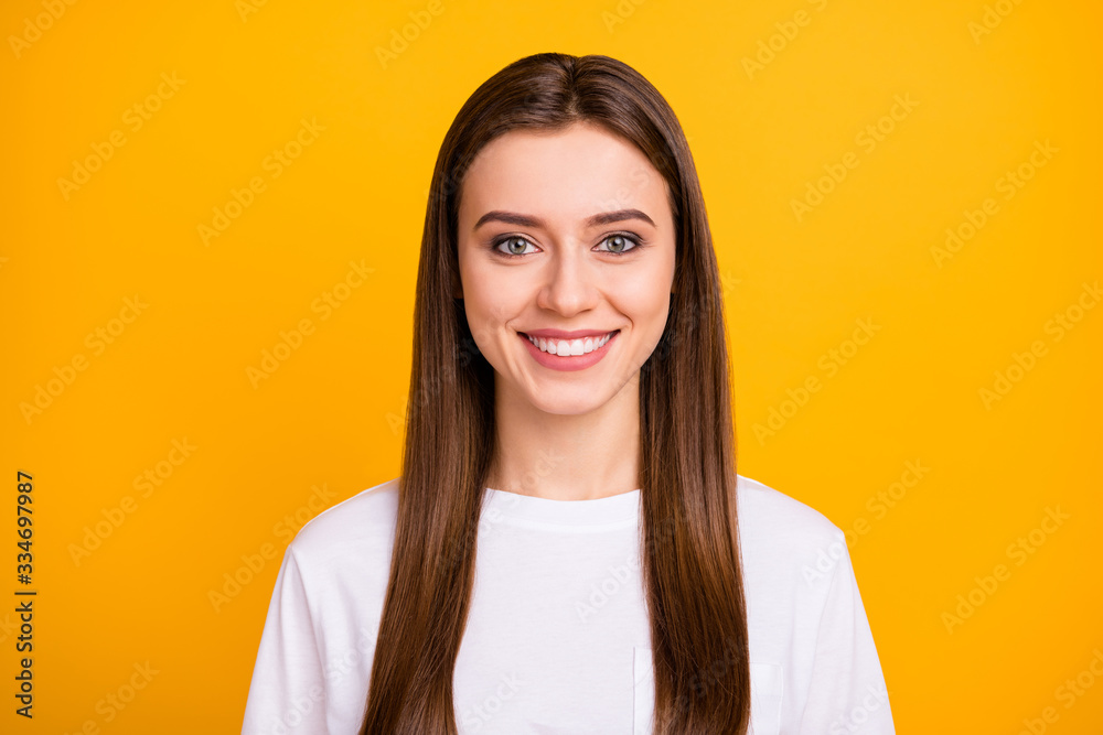Closeup photo of cute attractive cheerful lady good mood beaming smile long perfect groomed hairdo wear casual white t-shirt isolated vibrant yellow color background Closeup photo of cute attractive cheerful lady good mood beaming smile long perfect groomed hairdo wear casual white t-shirt isolated vibrant yellow color background