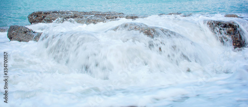 Beautiful seascape.Stones, waves, foam. Вanner photo