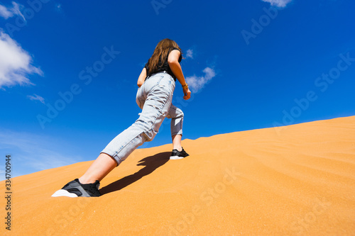 Desert walk on sand dunes in Sahara.