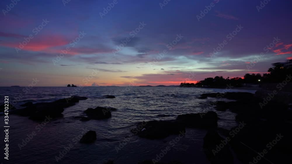 Colorful sunset over the beach in the tropical beach sea,the tropical paradise beach of Thailand Colorful sunset over the beach in the tropical beach sea,the tropical paradise beach of Thailand