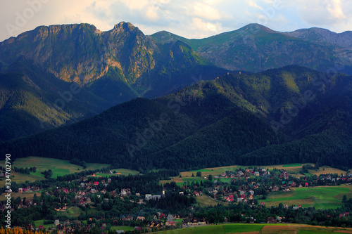 Panoramic view of Tatra Mountains seen from Zakopane in Poland with Giewont, Czerwone Wierchy and Nosal peaks in background