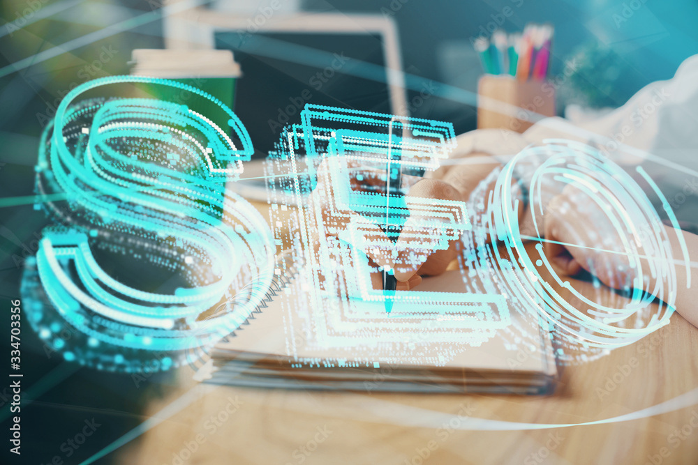 Multi exposure of woman's hands making notes with SEO icon. Concept of Search engine optimization Multi exposure of woman's hands making notes with SEO icon. Concept of Search engine optimization