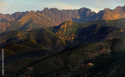 Fototapeta Naklejka Na Ścianę i Meble -  Panoramic view of High Tatra Mountains with Kasprowy Wierch, Czerwone Wierchy and Swinica peaks seen from Zakopane in Poland