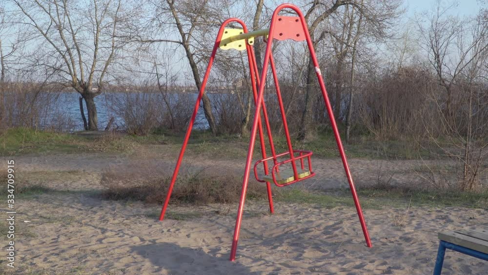Empty Swings In Playground, Child Abduction Concept Empty Swings In Playground, Child Abduction Concept