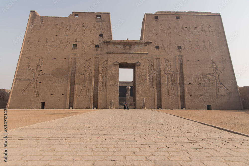 Naklejka premium Magnificent and ancient temple of Edfu, located on the western bank of the Nile River in Egypt, Africa, dedicated to the god of the Dioese Horus.
