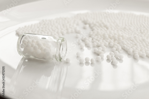Homeopathy granules medicine isolated on a White Background