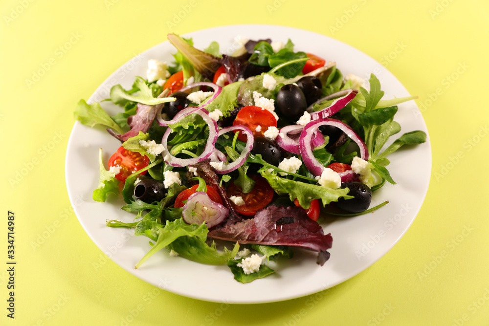 vegetable salad with olive, onion, tomato and feta cheese vegetable salad with olive, onion, tomato and feta cheese