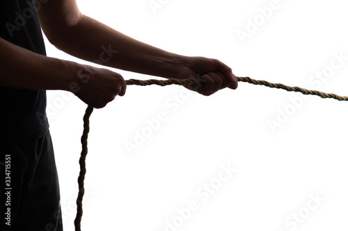 silhouette man hands pulling a rope tug of war on isolated white background, concept of leadership strength, pulling out of trouble and help