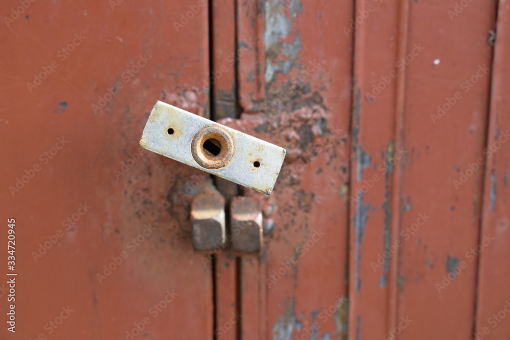 Iron lock on a metal safe with a paint wrapper. Iron lock on a metal safe with a paint wrapper.