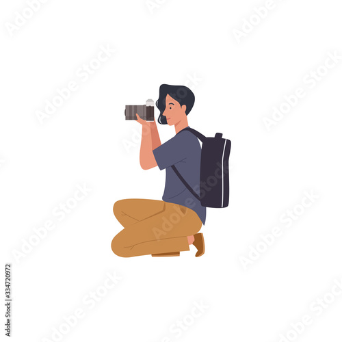 Male photographer holding a camera and take pictures. Vector illustration in a flat