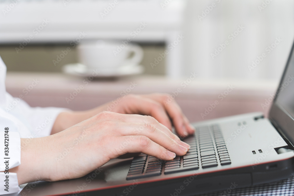 the girl working remotely during an outbreak of the coronavirus, selective focus, toned image. the girl working remotely during an outbreak of the coronavirus, selective focus, toned image.