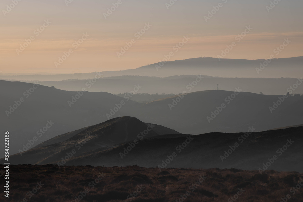 Sunrise over the misty Shropshire Hills, England, UK
