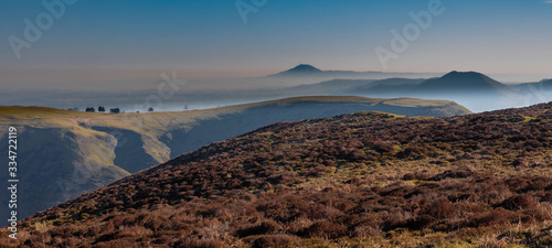 Sunrise over the misty Shropshire Hills, England, UK