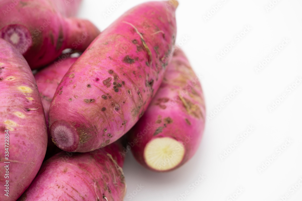 Pile of whole purple daikon radish isolated on white background Pile of whole purple daikon radish isolated on white background