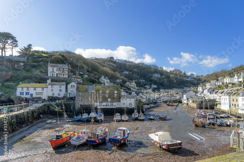 Polperro harbor at low tide in the county of Cornwall 