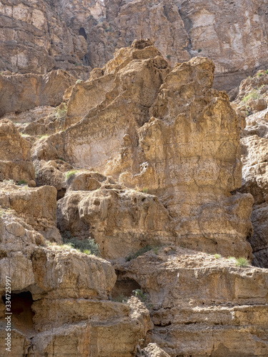 Wadi Shab, beautiful scenery, high rocks, stream with clear water. Oman