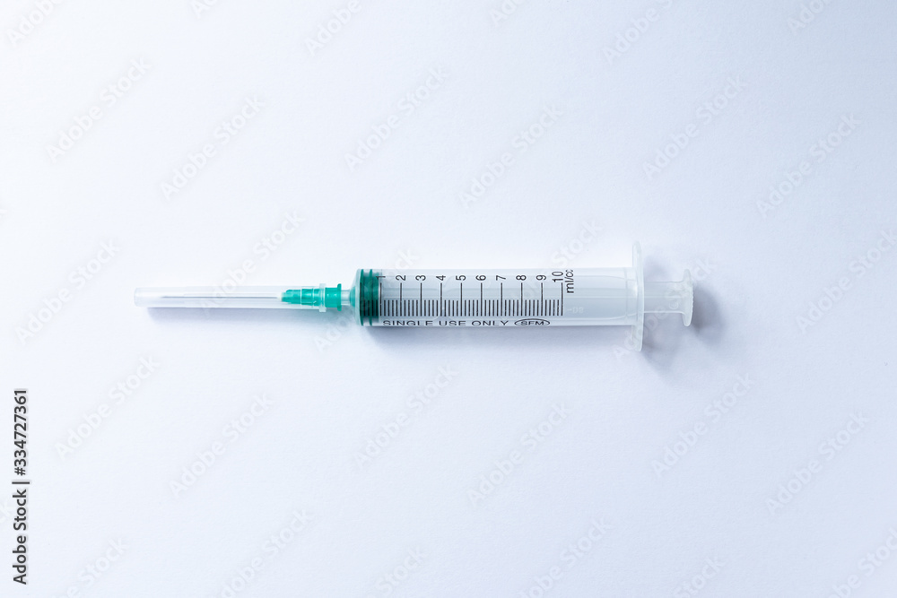 10 ml medical syringe for injection on a white background 10 ml medical syringe for injection on a white background