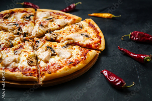 Appetizing pizza, Italian cuisine, side view, horizontal