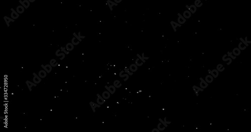 Flying dust particles on a black background