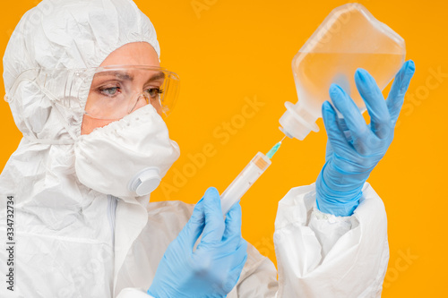 Lab technician takes a samp...