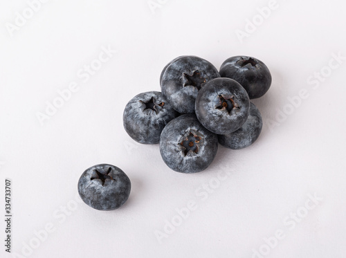blueberries with mint isolated on a white background