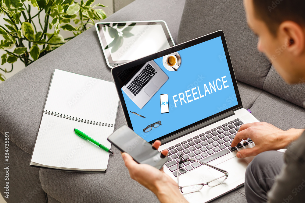 Man's hands using laptop with blank screen on desk in home interior. Man's hands using laptop with blank screen on desk in home interior.