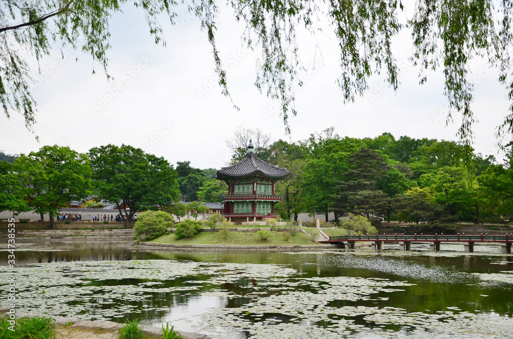 Hyangwonjeong a small pavilion in gyeongbokgung in seoul. Taken during warm summer day