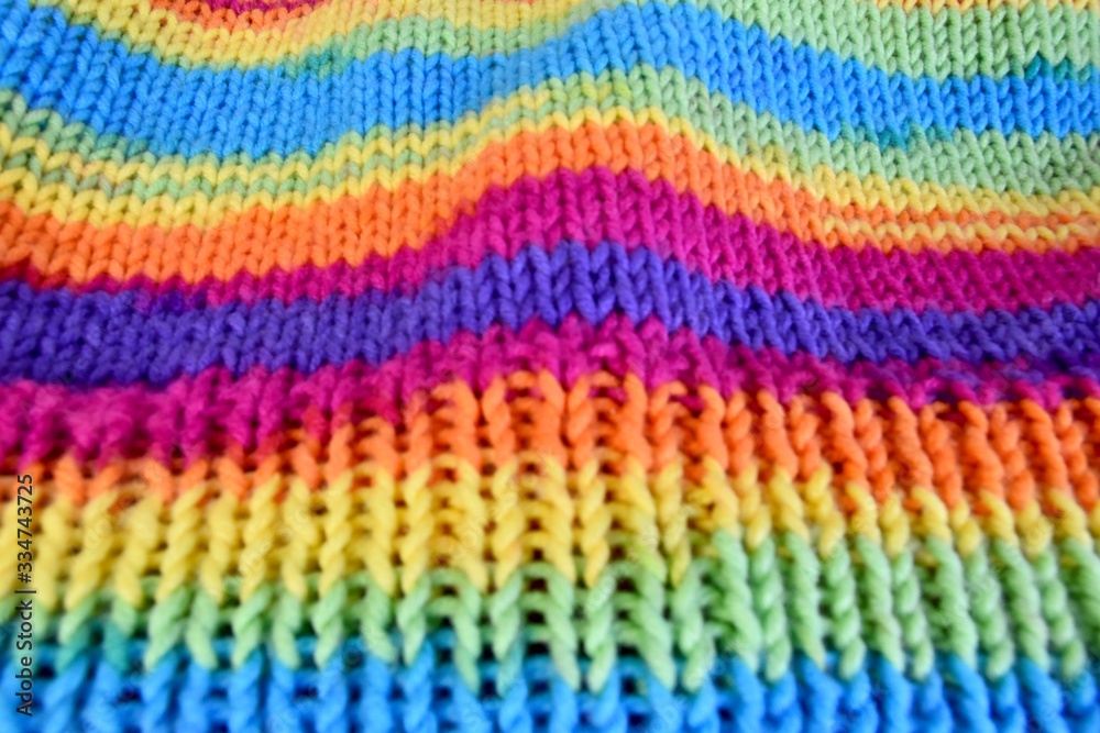 Rainbow self striping yarn knitting background 