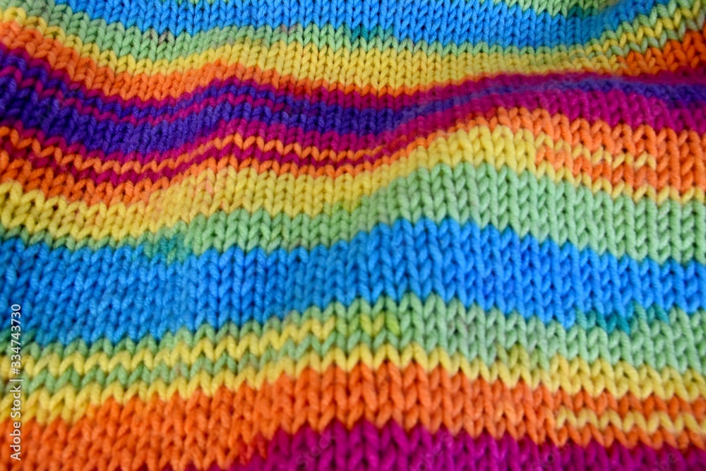 Hand knitting in rainbow wool background texture Hand knitting in rainbow wool background texture
