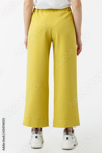 Young lady in a yellow pants