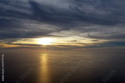 Magical sunset in Spain  stunning clouds. Shooting from the air. Seascape.