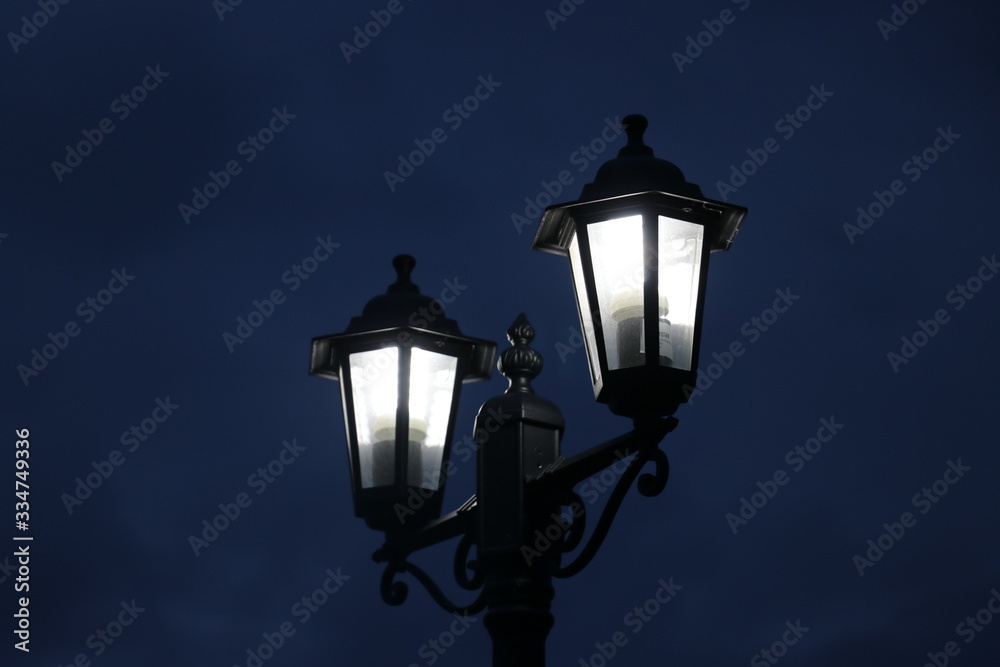 street lamp on blue sky background