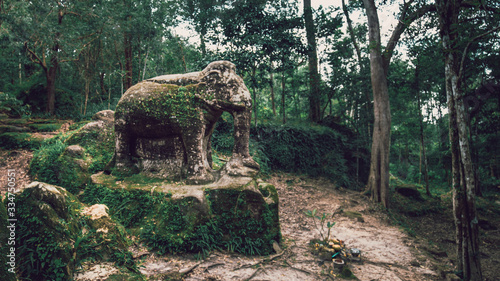 Photography Old elephant statue in Phnom Kulen, Siem Reap, Cambodia