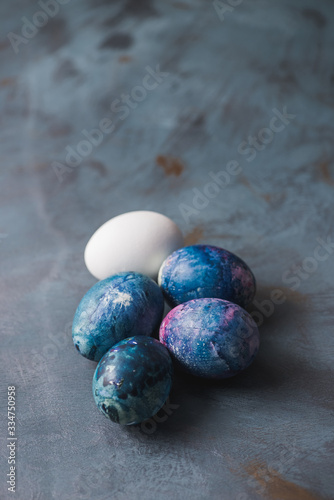 Easter colorful eggs. Blue background.