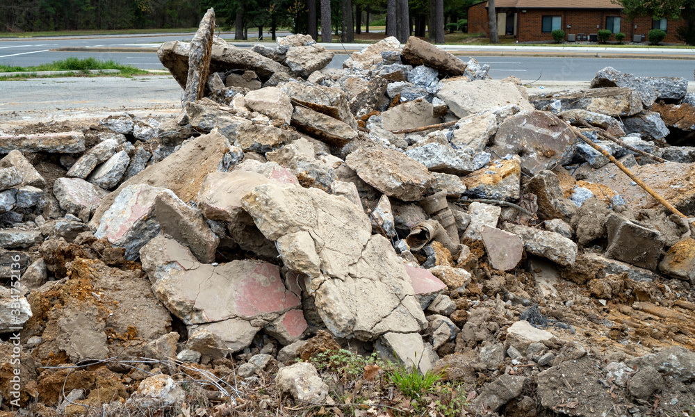 Concrete rubble and debris heap on construction site.