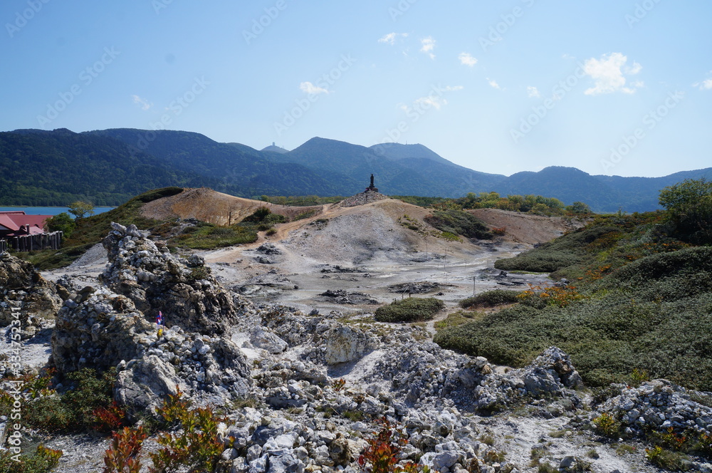 It is a photograph of Bodaiji Temple on Mt. Osore in Japan.  This is A Soto Sect on Mt. Osore in Mutsu City, Aomori Prefecture.