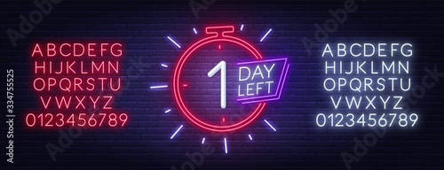 One day left neon sign. Countdown template. Neon alphabet on brick wall background.